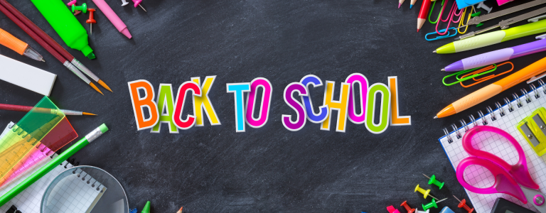 image of school supplies wit the words "back to school" written in colorful lettering on a chalkboard