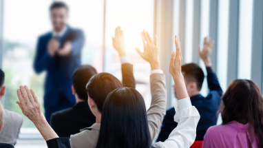 people raising hands